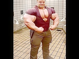 Massive Muscleman in tight Shirt…